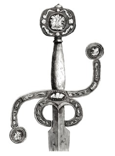 An English sword. circa 1580. with a very rare flat pommel and curved S-shaped grip. inlaid with