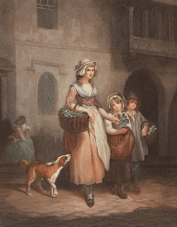 Young woman as a flower seller with a dog and two children. selling blooming primroses from a