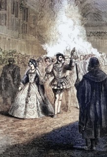 Henry VIII dancing with Anne Boleyn at a ball in the old Greenwich Palace in 1527. London. England.