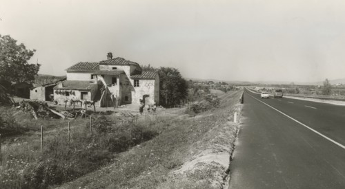 The Autostrada del Sole runs alongside Cascina Palestina near Monte San Savino.