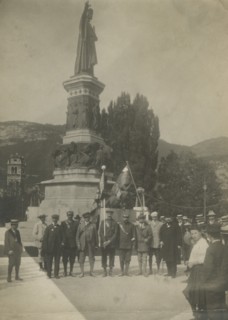 Members of the Touring Club Italiano  in front of the monument to Dante Alighieri in Trento. 
	
		1908