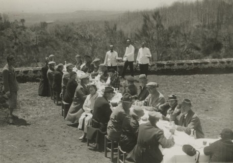Group lunch outdoors. 
	
		1924