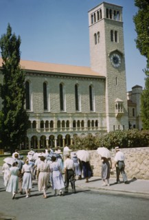 People walking towards Winthrop Hall Clock Tower building, University of Western Australia, Perth,