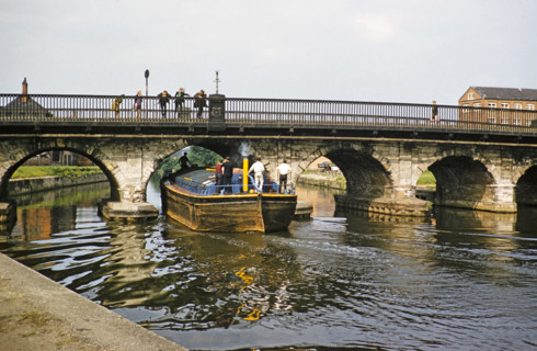 Steam powered barge passing under Trent Bridge of the River Trent, Newark-on-Trent,