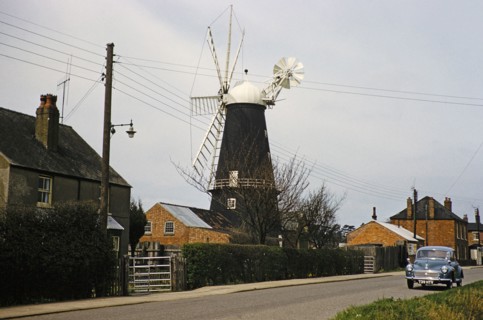 Historic windmill with Morris Minor car, Heckington, Lincolnshire, England, UK early 1960s also