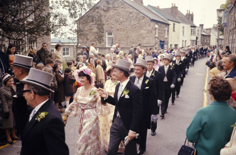Flora Day, Helston, Cornwall, England, UK 1973 - crowds watch couples perform the  Furry dance in