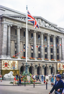 Flags and bunting decorating Council House building for Queen Elizabeth Silver Jubilee celebrations