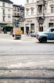 Traffic policeman in street in front of hotels, Bergheimer Strasse, Heidelberg, Baden-Württemberg,