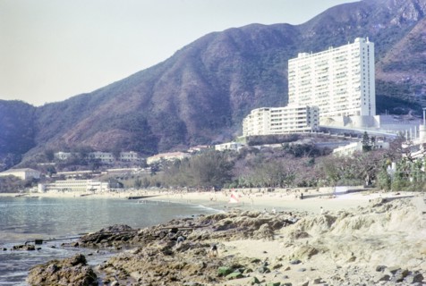 Skyscraper flats from beach in front of Repulse Bay Hotel, Repulse Bay, Hong Kong, Asia 1964.