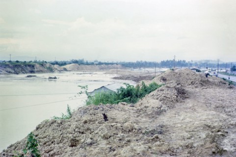 Waste spoil heaps polluted tailing ponds environmental impact of large scale tin mining, Batu