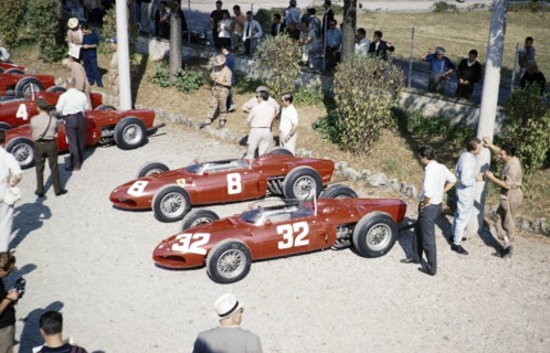 Ferrari Formula One team in  paddock  with sharknose Ferrari 156 F1 cars, Ferraris, Monza Grand