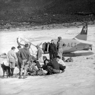 Crash of a REGA plane, wreckage upon a glacier 1957
