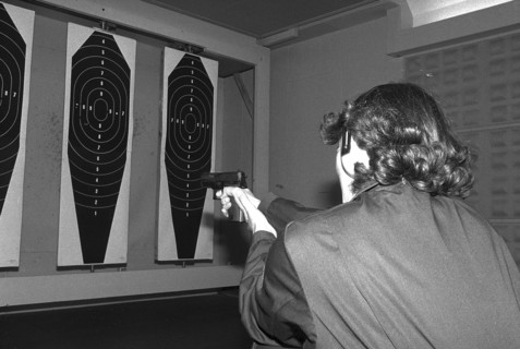 Policewoman Emma Meier at target practice 1981