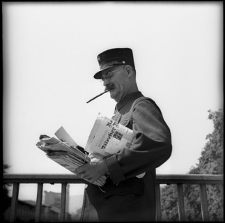 Postman smoking a cigar in Zurich 1947