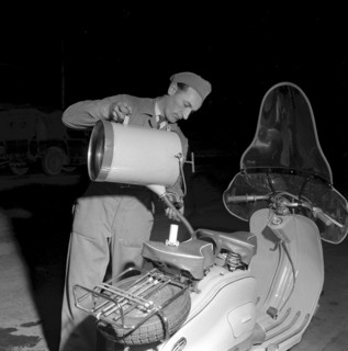 Christmas Eve 1955: petrol pump attendant in Lausanne