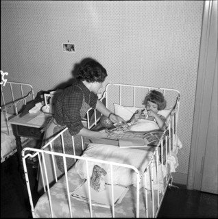 Sick girl in a crib at school for social work, Zurich 1953