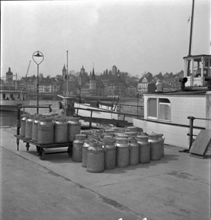 Lucerne, milk cans ready to transport by ship, Lake Lucerne 1940