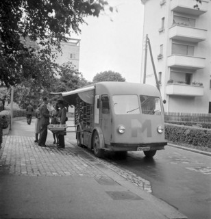 Zurich, Customer shopping in a Migros truck, mobile shop. Zurich 1947
