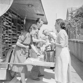 Zurich, Customers shopping in a Migros truck, mobile shop. Zurich 1947