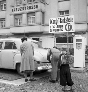 Petrol flling station, gasoline pump. Zurich 1954