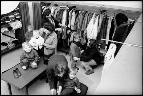 Shopping at a second hand clothes shop, 1968