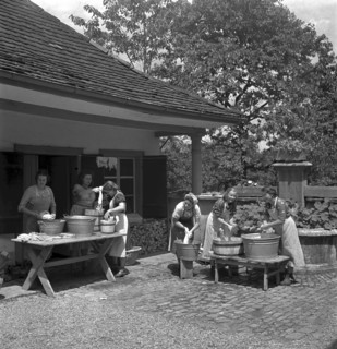 Washing clothes outdoor at women's school 'Heim' in Neukirch an der Thur, 1940