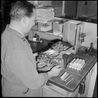 PTT Employee counting, sorting coins, Zurich 1958