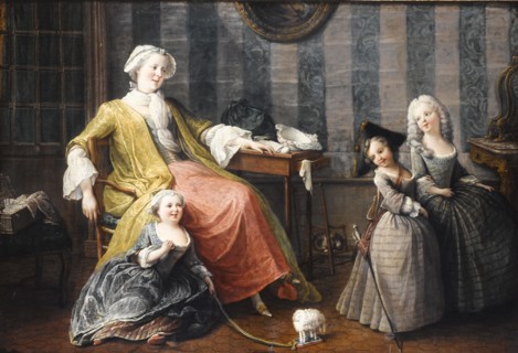 A Mother Watching Her Children Play.