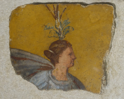 Head of a woman with a plant crown