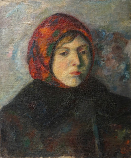 Portrait of a woman in a red headscarf