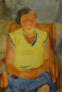Portrait of a woman in a yellow blouse