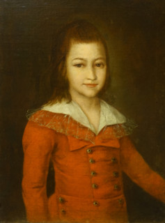 Portrait of a boy in a red caftan
