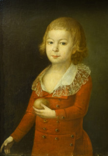 Portrait of a boy with apple