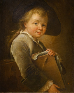 Portrait of a boy with a folder under his arm