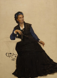 Lady playing with an umbrella.