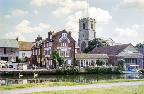 The Old Granary restaurant on the quayside and Priory Church of Lady St Mary.