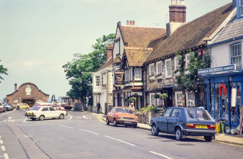 Cars parked outside Bugle Hotel.