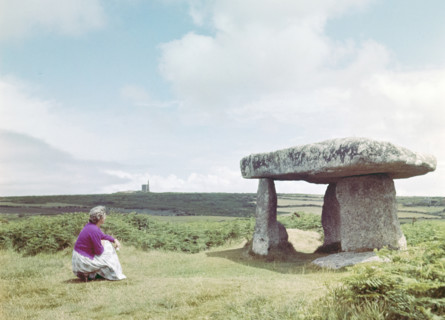 Woman visiting Lanyon Quoit.