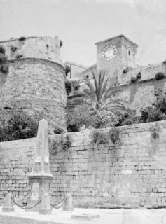Lascaris clock tower and fortress defensive walls of the Citadel.