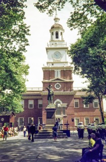 Independence Hall and statue of Commodore John Barry.