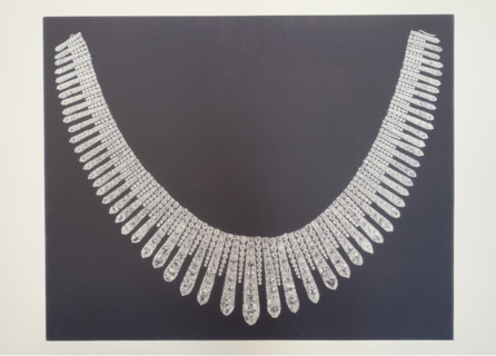 Diamond necklace or jewelled fringe.