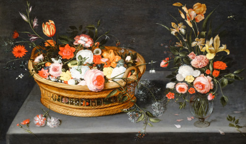 Basket of flowers and a bouquet in a vase.