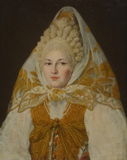 A Toropets merchant's wife in a headscarf woven with gold thread.