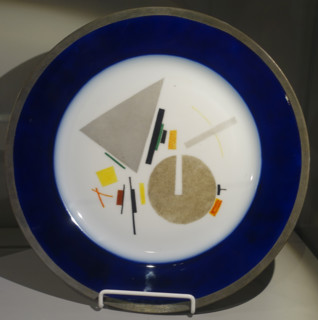 Plate with cobalt rim and Suprematist composition on the mirror.