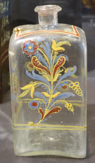Bottle with flowers.