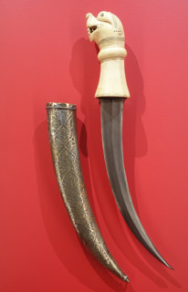 Dagger with scabbard.