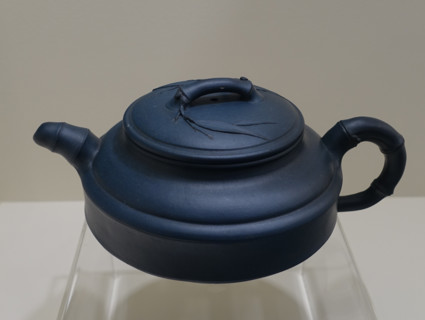 Teapot with bamboo motif.
