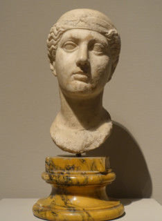 A woman in a cap.