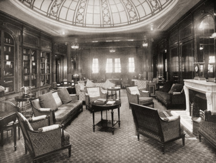 Cunard Line promotional brochure for 'Mauretania' circa 1930. The library and writing room.