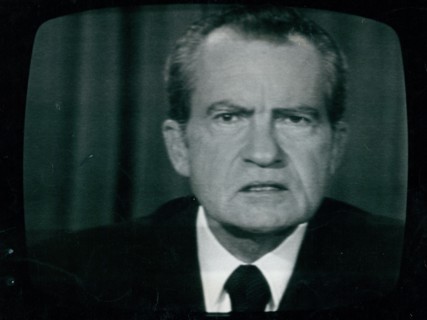 Photograph of President Richard Nixon close-up on television resigning from office